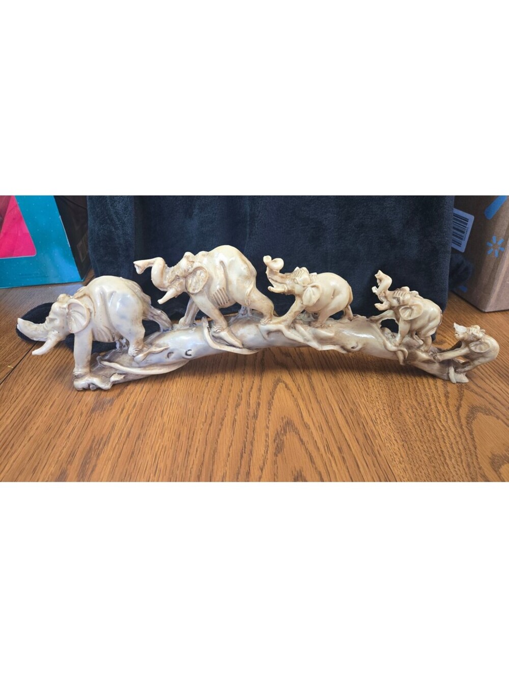 Carved Elephant Family Figurine on Branch Sculpture